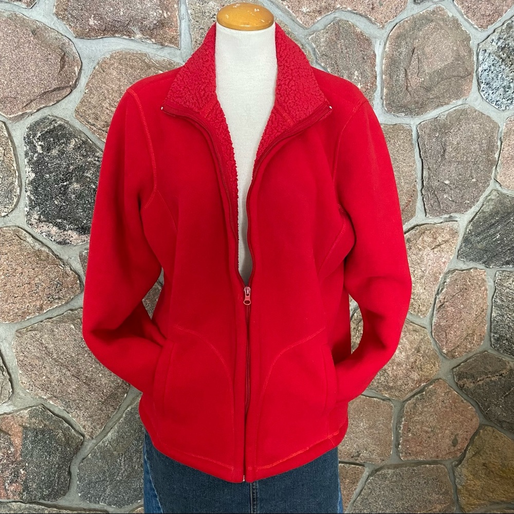 Red fleece jacket with thick lining.